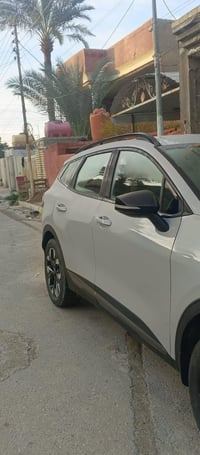 سبورتج موديل 24اكس لاين فور ويل داخل اسود مرقم بغداد وبسمي السعر 210$ق...