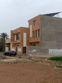 أرض ١٠٠م • واجهة ٧م • جسر ديالى