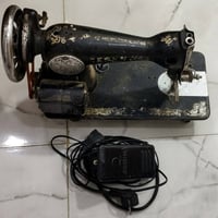 مكينة خياطة • جرباية طفل • بغداد