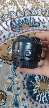 عدسه 50ملم كانون للبيع فتحه عدسه 1.8 الهاتف 07807079420