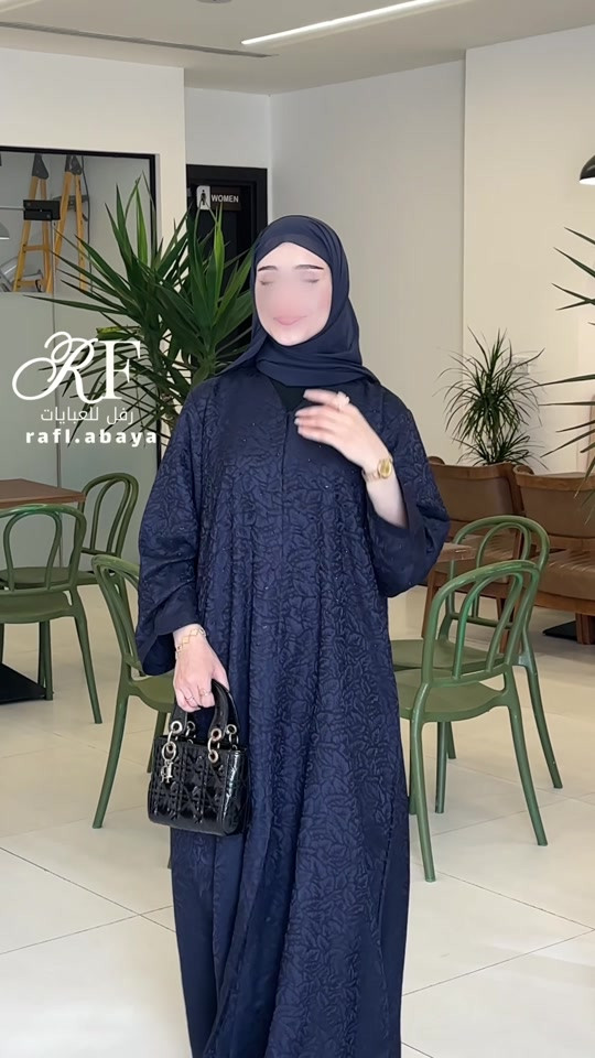 للحجز واتساب *********** عبايه الفضاء النيلي + شال 🦋 الخامه جاكار اماراتي  تكون طباقيات على طول العبايه  متوفره بجميع القياسات  #رفل_للعبايات #عبايات #كربلاء #عبايات_فخمة #بشتات_خليجية 

نص مكتوب في الصور:
- RF
- رفل للعبايات
- rafl.abaya