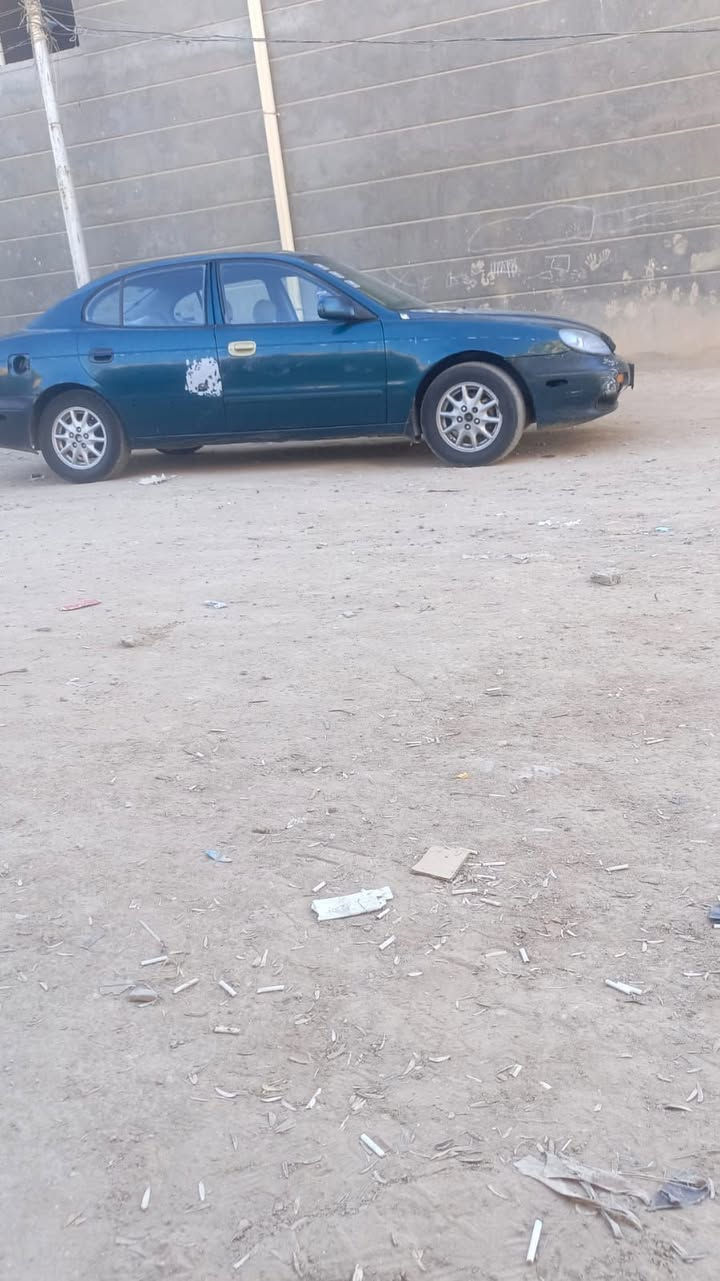 دايو نكنزه مديل 200 بلاد محرك مسكر كير تماتيك سيارة جاهزة تبريد شغال حداديه وباتري  وتواير جدد  كرهبايتها كله شغاله شرط ترايك بصره راعيه يريد مداور بالحله نقصها تور باين فقط براغيه مسولكه سعره 23وبيه مجال ***********مراوس يرهم العنوان ناصريه
