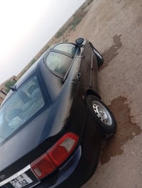 اوبتيما • ٢٠٠٤ • رقم نجف