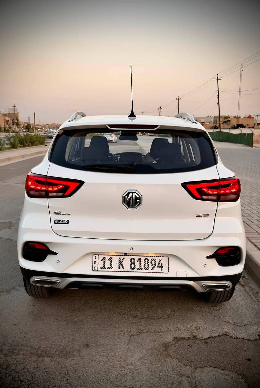 السلام عليكم ورحمة الله وبركاته
‎ MG ZS 2024 
 رقم بغداد الجديد الدولي السيارة بحالة الوكالة استلام شركة بنهاية 2025
السيارة زيرو بالضمان ماشية ( 4 الف )
بيها ملاحضات بسيطة سويتلها سونار مرفق ويا الصور
مواصفات السيارة 
* الموديل: MG ZS 2024
* محرك: 1500 اقتصادي 
* اللون: ابيض 
* ناقل حركة: أوتوماتيك
*  تشغيل بصمة + دخول ذكي
* بصمة ابواب
* ستيرن جلد ( تحكم جهتين ) 
* حاكية للإتصال والرد على المكالمات
* بلوتوث + USB
* شاشة لمس كبيرة متعددة الوسائط (اندرويد اوتو + كار بلي)
* كامرة خلفية دوارة 
* حساسات خلفية 
* هاند بريك دكمة 
* نظام اوتو هولد 
* نظام نزول منحدرات
* بصمة عدد ( 2 )
* تبريد قطعتين + تدفئة 
* لايت زنون عالي + ناصي
* لدات نهاري 
* بك لايت LED
* مرايا كهرباء + اشارات بالمري 
* كشافات هالوجين
* مثبت سرعة ESP
* مانع انزلاق المكابح APS
* حساسات نظام مراقبة ضغط الإطارات TBMS
* جنوط أصلية 
* ويل كب 
* ايرباك AIR BAG عدد ( 2 )
* حاملات اكواب عدد ( 6 )
* سبير منازل من الجنطة ولا مفتوح + المعدات كاملة الأصلية غير مفتوحة

السعر 112 و بيها مجال بسيط وماكو بهيج سعر زيرو 
مكان السيارة بغداد / حي الجهاد  الضباط
رقم الهاتف / *********** اتصال أو واتساب
