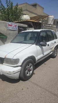 كيه سبورتج موديل 2000مكينه وكير أكسل خير من الله رقم بغداد  باسمي تحوي...