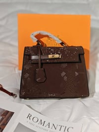 حقيبة هرمز • جلد طبيعي • بطانة شامواه