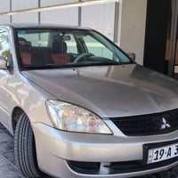لانسر ٢٠١٠ • بدون صبغ • محرك ٢٠٠٠