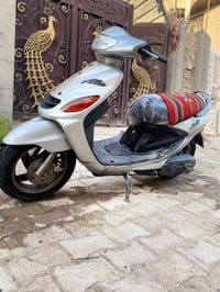 أكزاز • ١٠٠ • كهربائية