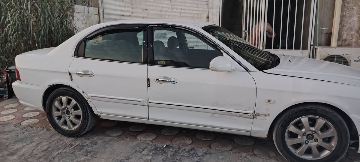 🚗 كيا أوبتيما 2006 للبيع 🚗
​المواصفات والتفاصيل:
​الموديل: 2006
​المحرك: 6 سلندر - حجم 2700 (2.7L)
​اللون: أبيض
​العجلات: ويل كب قياس 16 مع تخم تاير ياباني جديد
​الحالة العامة والخدمات:
​التبريد والتدفئة شغالة وبأفضل حالة.
​صدر أمامي وخلفي جديد بالكامل.
حادثه جاملغ الايسر من امريكا
بيه اخياس بالهلال الخلفي مثل مابين بصور
وبيه عته ب٤٠ فقط
السياره باسمي رقم انكليزي  بغداد
☐ مكاني بابل ابي غرق  
☐ ٥٥ورقه وبيه مجال وهذه رقمي  ***********
