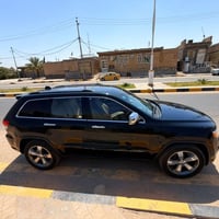 جيب شيروكي • موديل 2015 • رقم بغداد