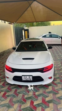 جارجر 2015 RT ماكس  ماشيه 98 مايل حقيقي  رقم بغداد   المواصفات  فول مو...