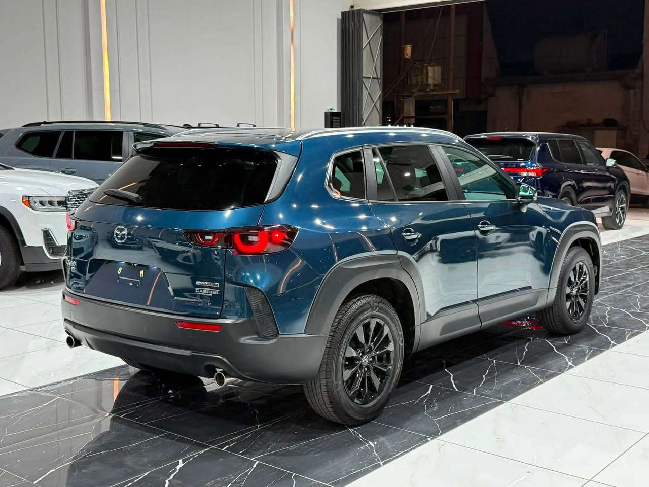 ‎مازدا Cx50 2024 فورويل AWD
‎حجم المحرك 4 سلندر 2500cc تنفس طبيعي 
‎عدد المقاعد 5 راكب
‎السیارة ماشي 8 الف
‎حادث نص جملغ الخلفي  السائق 

‎مواصفات فول
‎- بصمة
‎- دخول ذكي بدون مفتاح
‎- دبل اكسل
‎- بانوراما
‎- مود درايڤ ايكو وعادي وسبورت
‎- رادار امامي خلفي
‎- تحديد مسار
‎- نقطة عمياء
‎- كشنات جلد
‎- شاشة
‎- ⁠كاربلي CarPlay 
‎- كامرة خلفية
‎- تبريد مركزي قطعتين
‎- صندوق خلفي كهرباء
‎- سايد بريك لمس
‎- اوتو هولد
‎- لايت امامي ليد
‎- هيتر -تبريد كشنات امامية
‎- هيتر ستيرن 
‎- اشاير مري
‎- تخم تاير جديد 
‎- تخم دسكات جديد 
‎وبقية المواصفات موضحة بالصور ‎
‎مکان سیارة اربیل السیارە رقم کاتي تترقم شمالي
‎للاتصال والاستفسار
‎☎️کورك ***********
‎‏‎☎️اسیاسیل ***********
