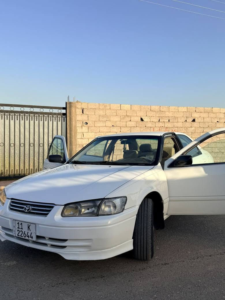 السلام عليكم للبيع كامري موديل 2000رقم بغداد وبسمي مكينة كير تبريد كفالة جاهزة للاخير بيهة ضربة جاملغ خلفي موقوية بيهة مكانات صبغ بالحزام موكلة للجمالية قمارة بلادمكاني بغداد الدورة ***********بي وتساب مكينة 2200اربعةسلندربلادية بغداد, العراق
