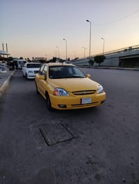 كيا ريو 2003 سياره مكينه وقير وتخم تاير سياره جاهزه كهربائيات اجازه من...