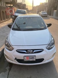 2013  101 km  80 $  07723543036  نص مكتوب في الصور: - iQ