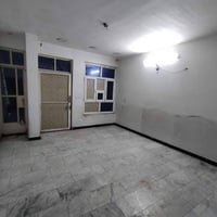 الدورة شارع 60 • طابق ارضي معزول • غرفة نوم