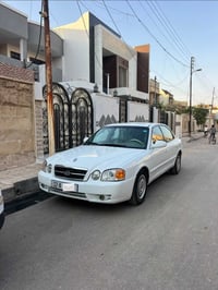 اوبتيما • ٢٠٠٥ • توماتيك