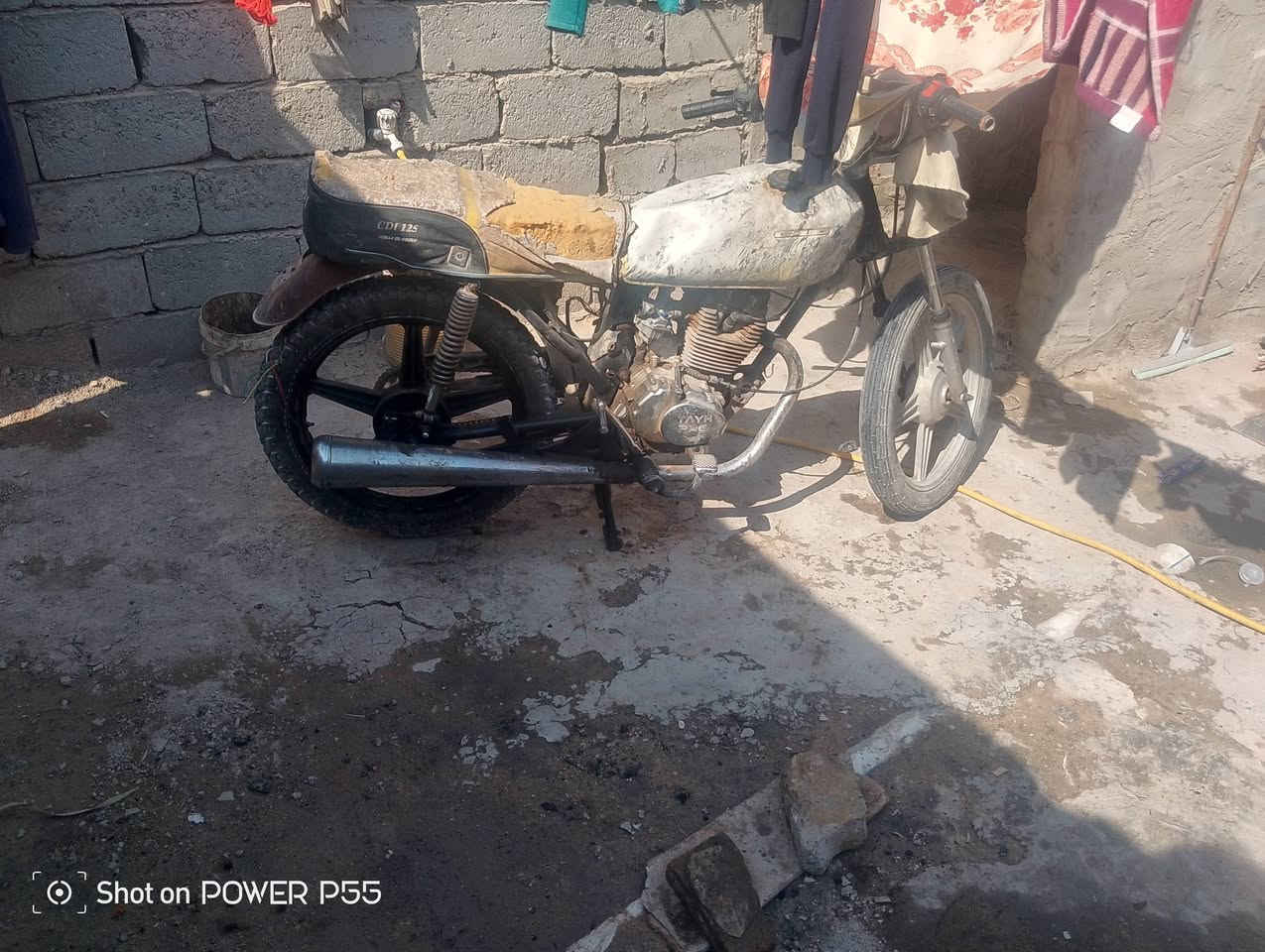 دراجه للبيع 5 قير كلك ورا ملعب النجف 110 السعر***********

نص مكتوب في الصور:
- Shot on POWER P55