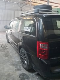 دوج كرفان 2009 sxt محرك 3800 غرفه وكشنات موديل حديث لايتات عدسات ويل ك...
