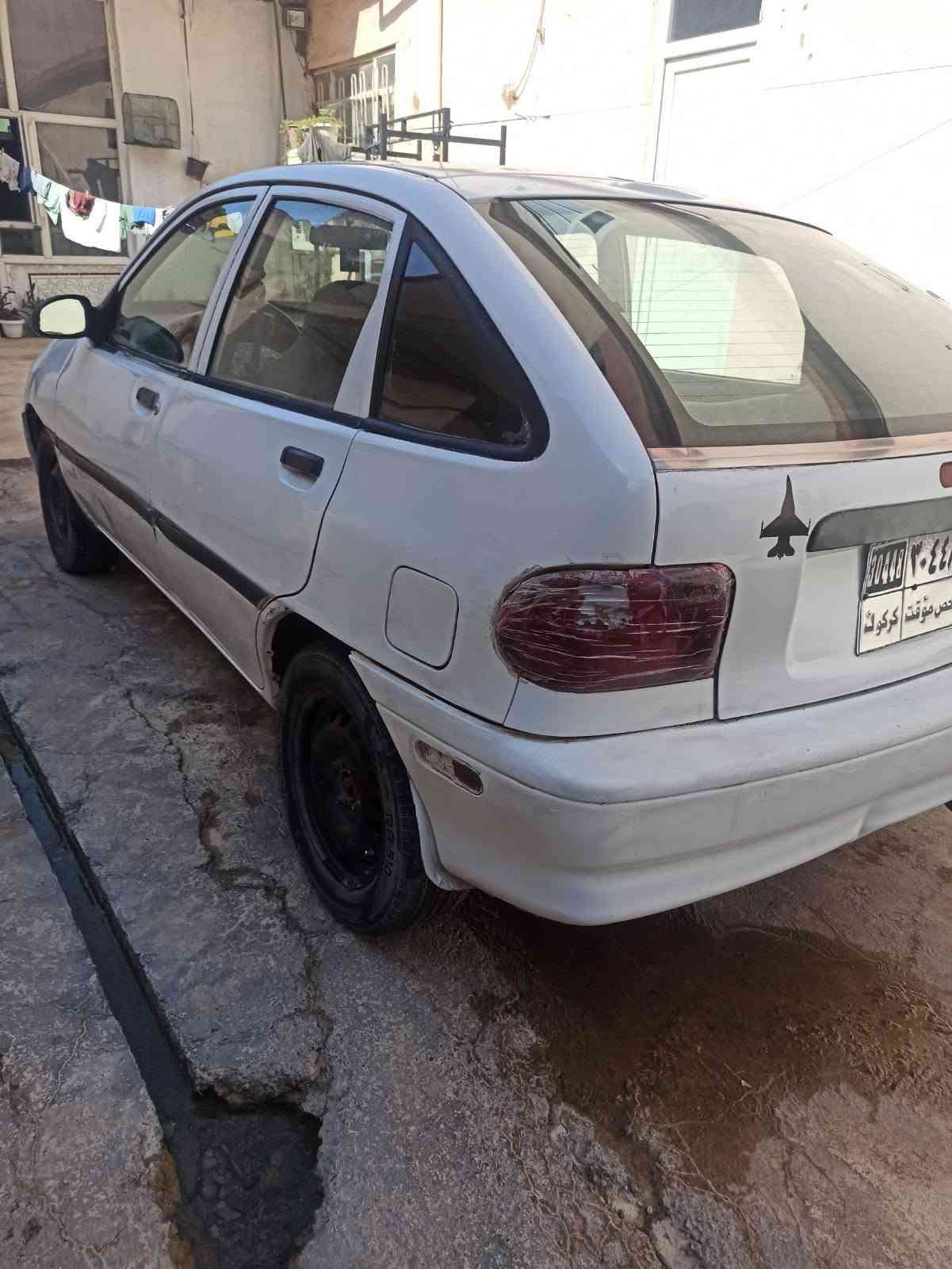 كيا موديل ١٩٩٧  كير اوتوماتيك مكينة مازدة كير و مكينة بة شةرت سنوي و رقم و واجهة و باكانة لة كةلية اصلي بي مشكله و بي عيبة لة هةوليرة سيارةكة تلفون  *********** واتساب أربيل, العراق
