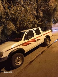 نيسان فورويل • ٢٠٠٥ • رقم نجف