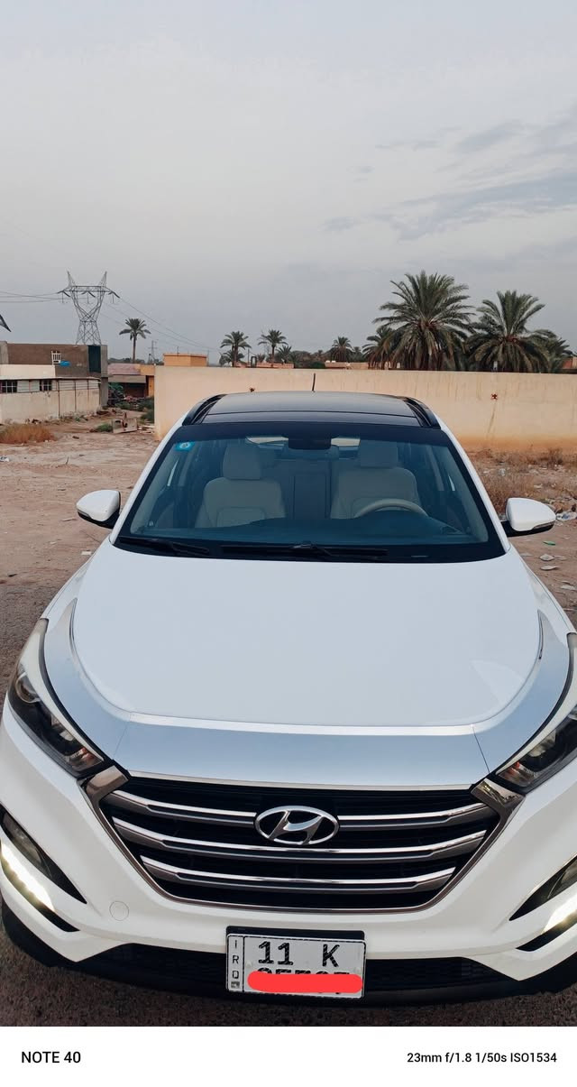 سيارة توكسان  خليجية بيضاء، موديل.2018. رقم بغداد الإنكليزي السنوية باسمي ، محرك 2000 دوش المرغوب  ماشيه   104
تخم تايرات ، صدر امامي وخلفي ممتاز ، كير ومحرك ممتاز قطعتين تبريد ممتاز 
كفاله من صبغ وتبديل بيها تكشير بسيط موضح بل صور  وسونار ناشره
مكان السيارة بغداد دوره  تحته كتلوك الشركه بعده

المواصفات السيارة
بنوراما 
1/تحكمات
2/اشاير مري
3/اواكس + نظام USB
4/تبريد قطعتين
5/شاشة
6/كاميرا خلفية
7/مري شفط
8/يدات نيكل
9/  مظلة جنطة
10/لد بلوجكتور
11/سايد بريك قدم
12/ويل كب العدد 5
13/سويج ريمونت 
السعر// ١٦٤ وبيها مجال
وهذا رقمي ***********

نص مكتوب في الصور:
- NOTE 40 23mm f/1.8 1/50s ISO2007
- NOTE 40 23mm f/1.8 1/50s ISO1981
- NOTE 40 23mm f/1.8 1/50s ISO1512
- NOTE 40 23mm f/1.8 1/50s ISO1063
- NOTE 40 23mm f/1.8 1/50s ISO2369