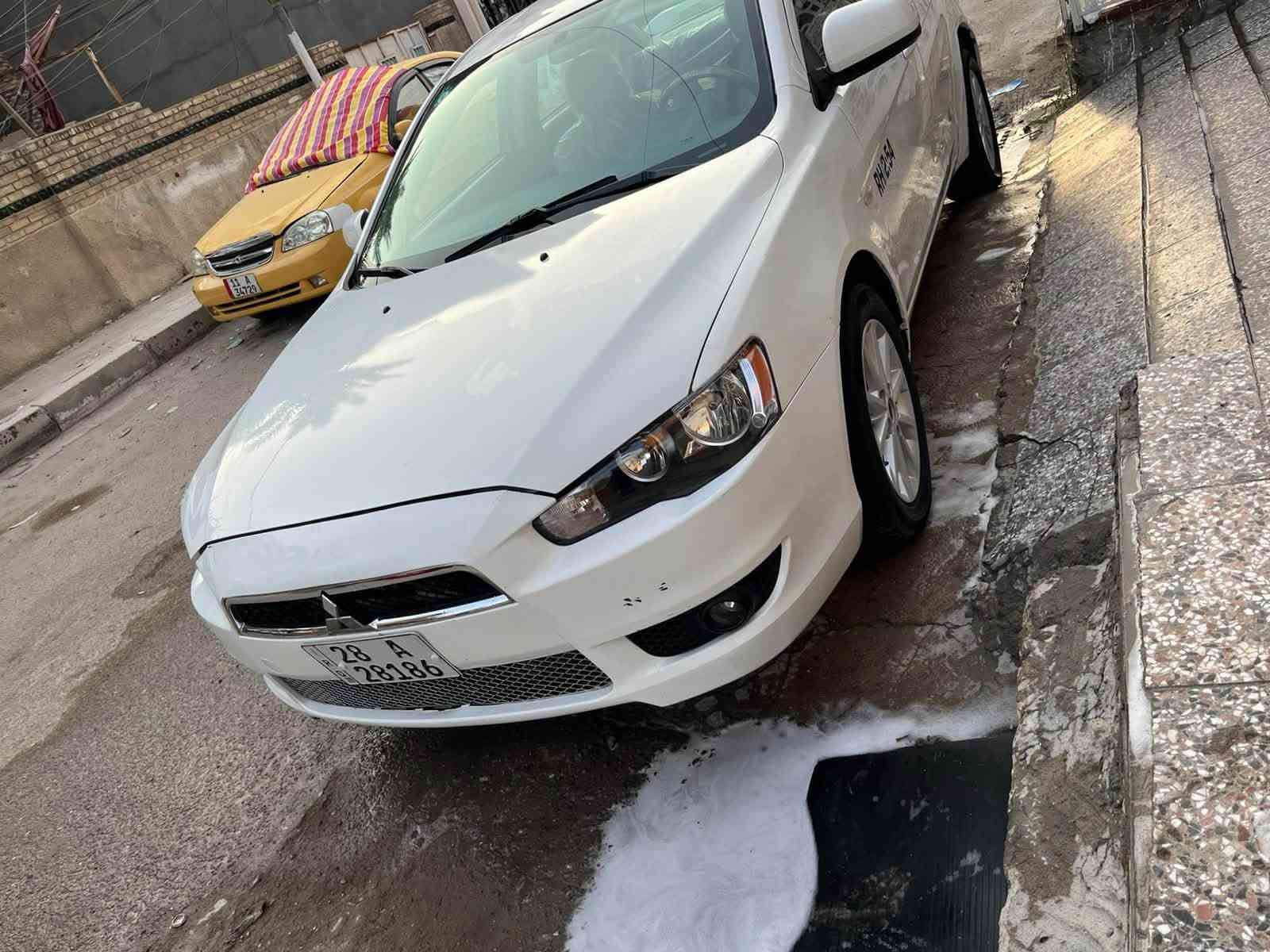 لانسر قرش • ٢٠١٤ • رقم دولي