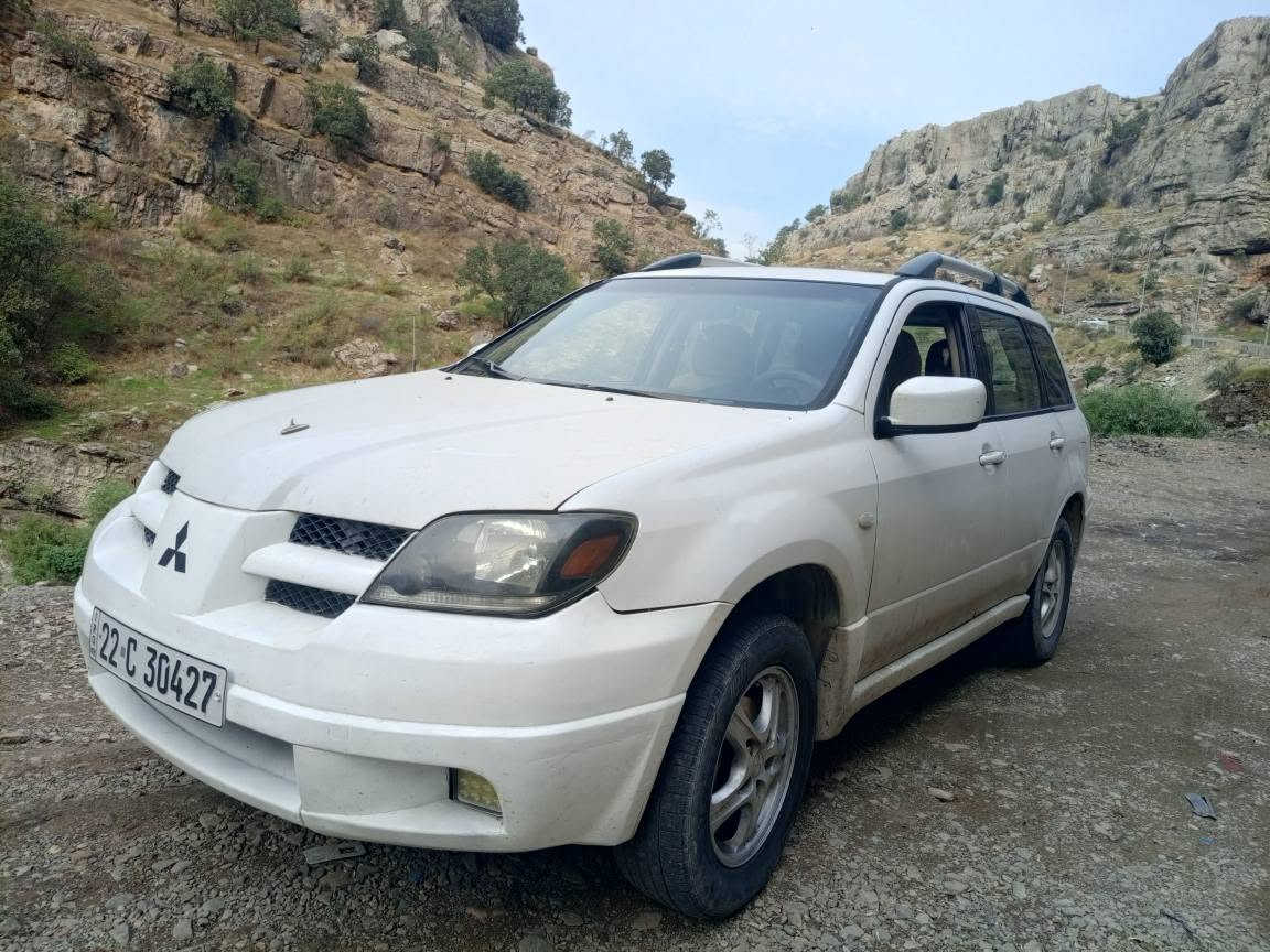 اوتلاندر ٢٠٠٣ • دبل اكسل AWD • اوتوماتيك