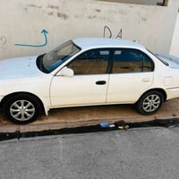 كورلا موديل ١٩٩٥  سيارة نظيفة وحيل حلوة وما ناقصها شي وتبريدها قبل كم ...