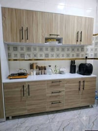 كاونتر خشب MDF ارضي وملحق قياس مترين وسنك متر و20 مرمر سعر 325 الف لبي...