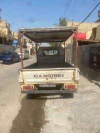 كيا ام عيون • ٢٠٠٢ • رقم ديالى