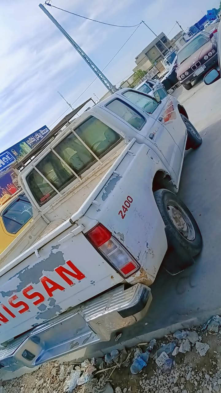 نيسان ٢٠٠٣ مزاد بدون صبغ كفاله محرك كير جدد بيع فقط السعر ٥٢ ورقه مجال حك الجيه فقط ديالى بلدروز الاستفسار ***********
