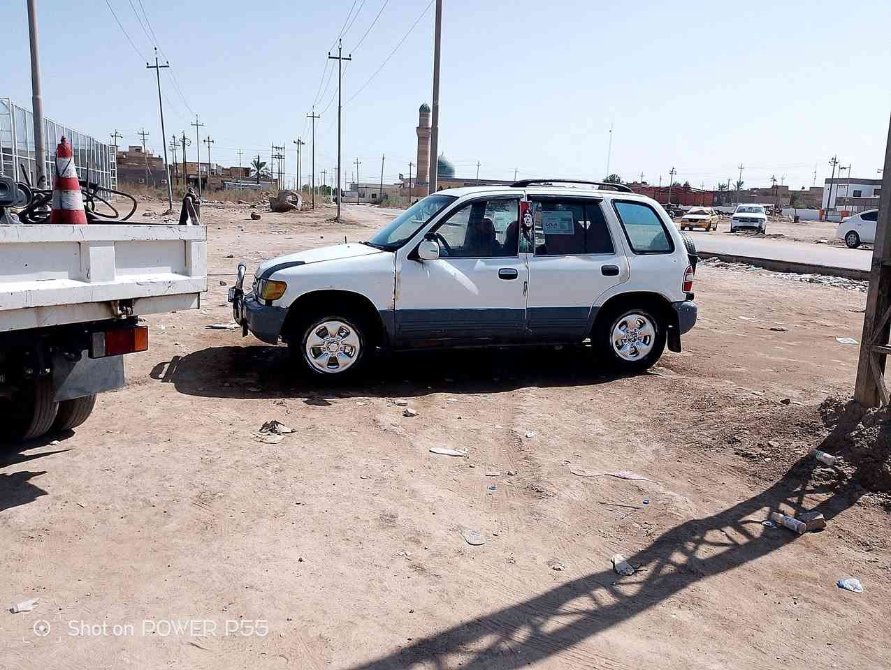 بسم الله سياره للبيع كياسبورتج موديل 1993فور ويل دفع رباعي،مكينه وكير كفاله،،حداديه تخم تاير جديد باتري جديد تحويل مباشر سنويه مشروع وطني،بلادي وضع شركه،سعر،٣٣،بي مجال حك جيه احلى من صور،***********, ناصرية قضاء الشطره،،،

نص مكتوب في الصور:
- Shot on POWER P55