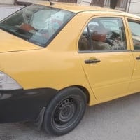 لانسر • ٢٠١٠ • مكينة وكير