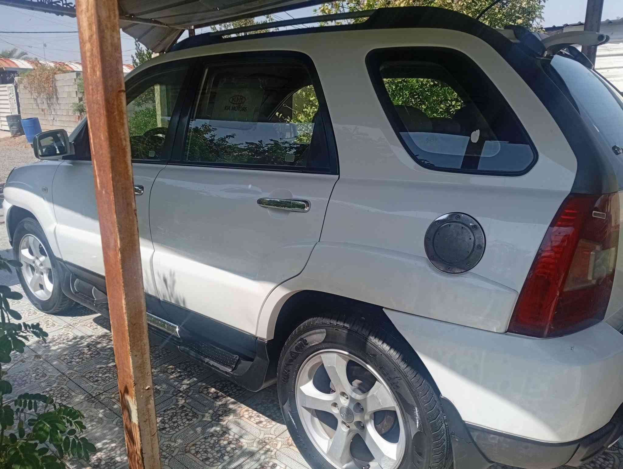 كية سبورتج موديل ٩ مكفولة كير ومحرك سونار موجود مكان سيارة صلاح الدين بلد محرك ٢٠٠٠ سيارة متصرف علية  *********** رقم بغداد بسمي
