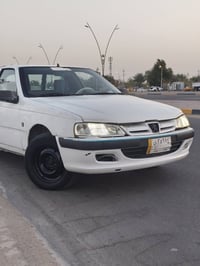 مكينة وكير واكسل • كفالة • رقم بغداد