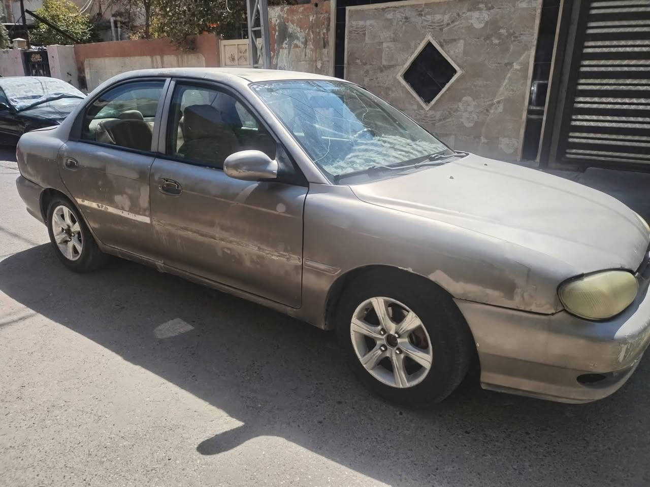 كيا سيفيا 2001محرك وكير اوتو خير من الله السعر 25قفل مكان السياره بغداد دوره البعيثه مابيه خياس جارده صدر امامي خلفي تعبان شرط تحويل *********** شديتلهن ماصدات جديد
