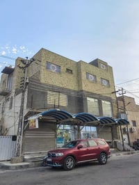 بناية تجارية • حي العامل • مؤجرة