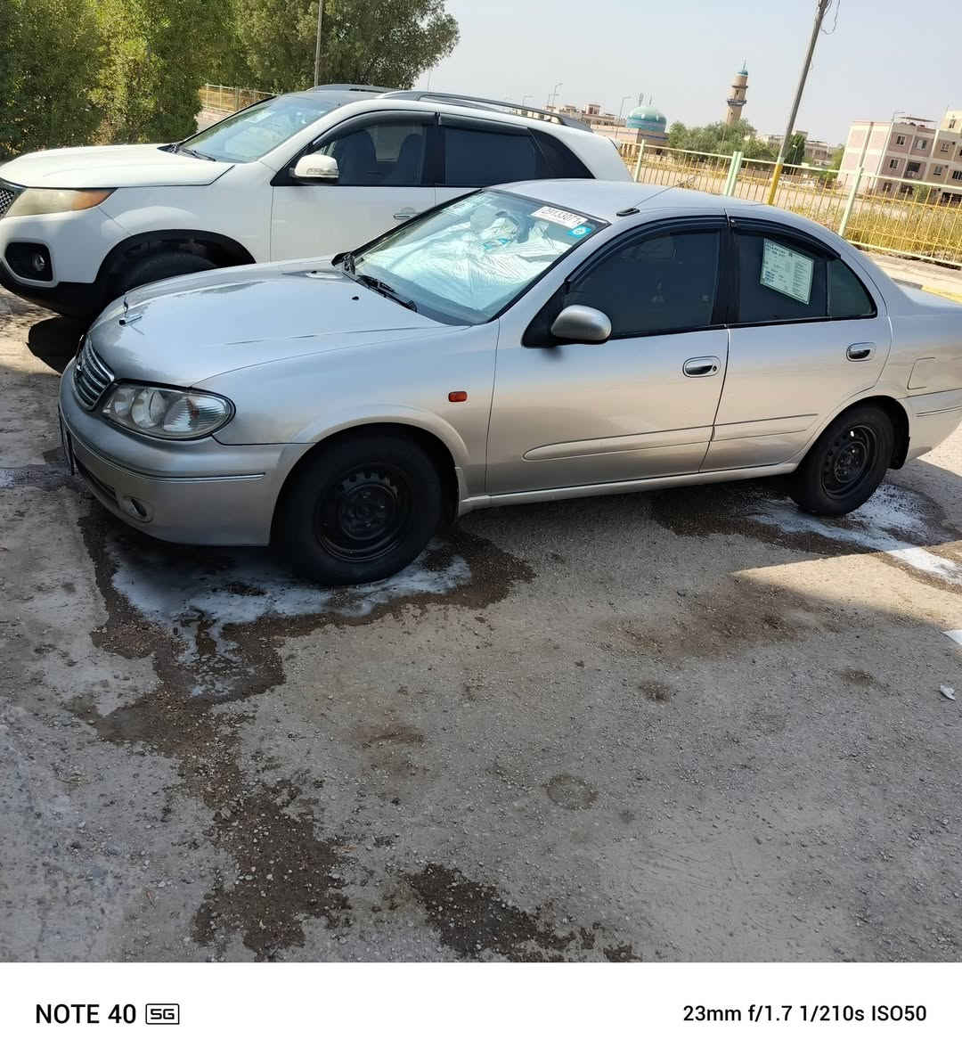 للبيع نيسان صني ياباني
 موديل 2009 رقم بغداد الجديد بسمي
 مكينه 1600 قبق اسود
 فول أوتوماتيكي
 كير ومكينه وحداديه وتبريد مكفولات
 سعرها 80 وبيه مجال
 مصبوغه عام للجماليه 
اللون رصاصي يعني سلفر
 السياره بالحله بحي الزهراء يم جسر الام 
***********  ***********

نص مكتوب في الصور:
- NOTE 40 5G 23mm f/1.7 1/289s ISO50
- NOTE 40 5G 23mm f/1.7 1/210s ISO50
- NOTE 40 5G
- 23mm f/1.7 1/281s ISO50
- NOTE 40 5G 23mm f/1.7 1/20s ISO5212
- NOTE 40 5G 23mm f/1.7 1/25s ISO4337
- NOTE 40 5G 23mm f/1.7 1/209s ISO50
- 23mm f/1.7 1/33s ISO2033
- NOTE 40 5G 23mm f/1.7 1/33s ISO1707
- NOTE 40 5G 23mm f/1.7 1/25s ISO2879