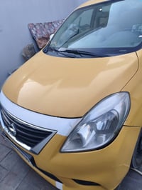 نيسان صني موديل 2014 رقم بغداد ماناقصها اي شي سعرها 80$ عنواني كربلاء ...