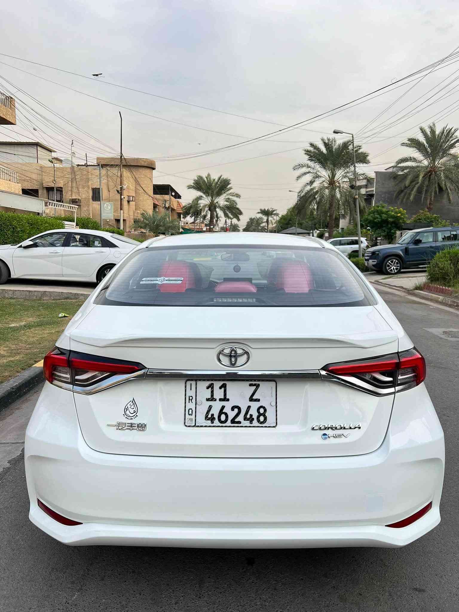 كورلا هايبرد • ٢٠٢٤ • جلد احمر