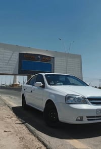 وبركاتة سياره نوع اوبتره موديل 11 كارتون كلشي شغال بيهاا واحد على واحد...