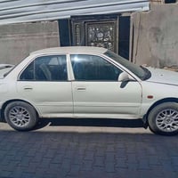 بروتون • ٢٠٠٢ • محرك جديد