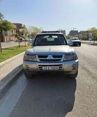 باجيرو 2001 محدثه 2007 كامل داخل و خارج سنتر لوك صندوك كهربائي شاشه وك...