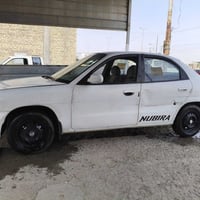 دايو نوبرا  موديل 97 رقم بغداد الجديد شرط التحويل كير اوتوماتيك بس يخر...