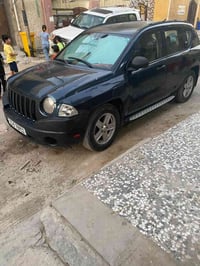جيب كومبارس موديل 2008جاهزة من كلشي بسمي السعر ٦٠ بغداد حي اور 0771336...