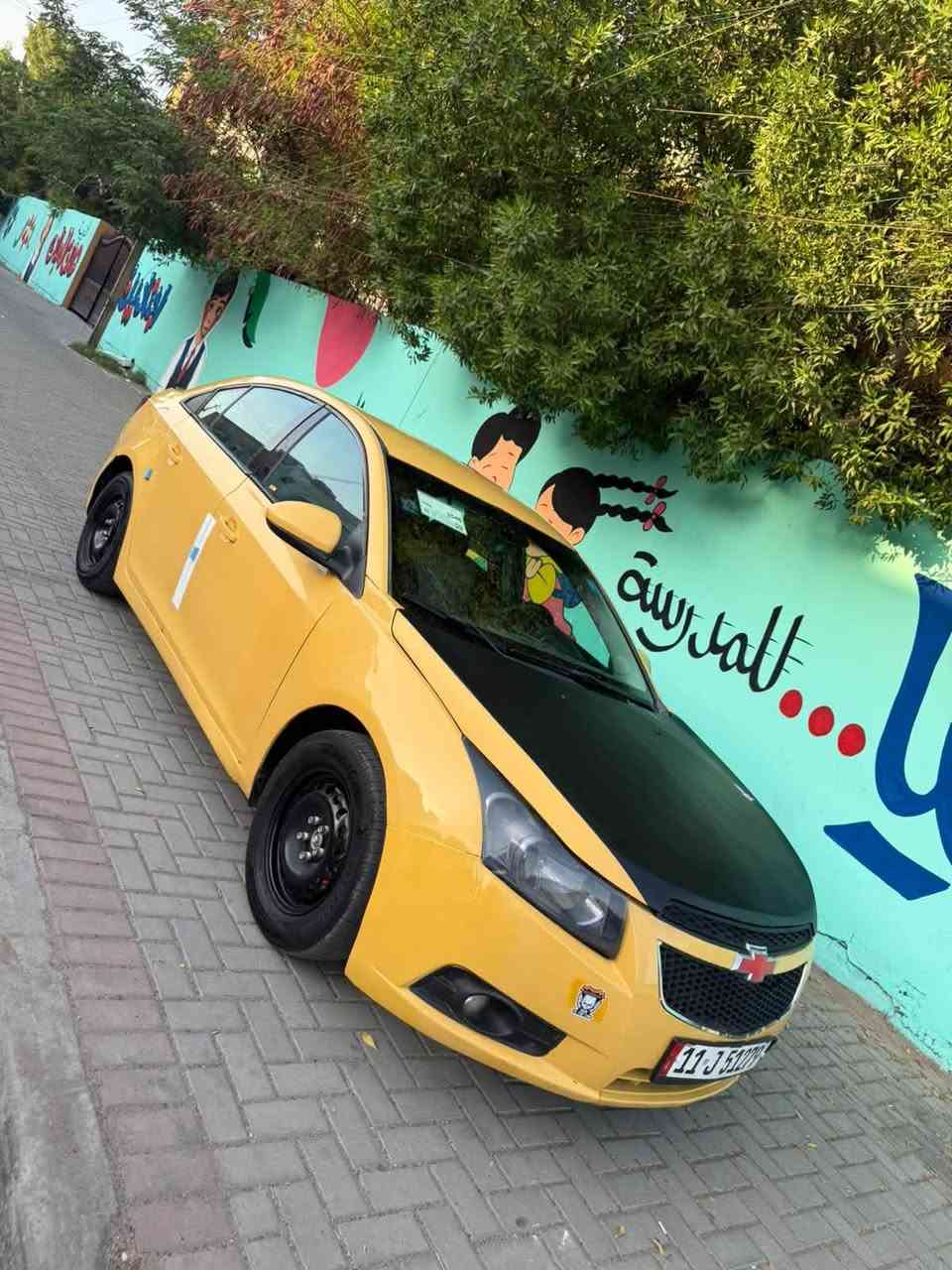 السلام عليكم شوفر ليت كروز البيع موديل 2013 رقم بغداد بسمي نكليزي مصفره هيه وغرامات  تحويل ثاني يوم وارد خليجي السياره كير محرك تبريد صدر مابيها أي نقص محرك 1800 تنفس طبيعي كير اوتماتيك ميكانيك المرغوب مو كهرباء السياره حلوه ومرتبه بيها طخه بخشم الجاملغ شاشه جبيره كامره حساسات السعر (58) وبيها مجال مكانها بغداد حي سومر الشعب التصال (***********)
