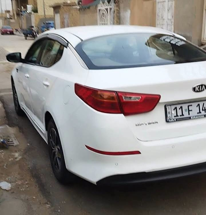 أوبتيما 2014 • مكينة 2000 • وارد كوري