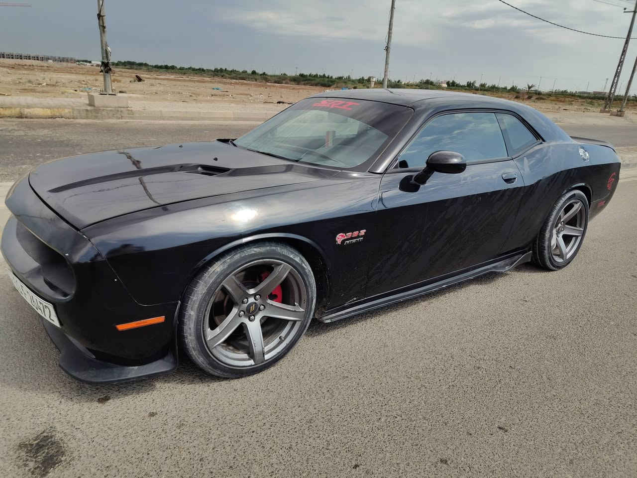 جالنجر مديل 2014 محرك 5700  v8 سياره نضيفه سونار بالصور ماشيه 80 ميل جاهزه مكينه كير تبريد حداديه رقم بغداد للبيع او مراوس حسب القناعه ***********.  مكاني كربلاء
