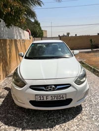 اكسنت 2014وارد امريكي  بيها جاملغ خلفي وباب خلفي بدون دواخل سياره 1600...
